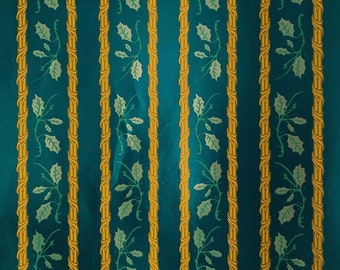 May include: A repeating pattern of gold vines with green leaves on a teal background. The vines are intertwined and have a decorative design.