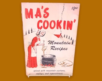 First edition 1966 Ozark’s cookbook, MA’S COOKIN’: Mountain Recipes spiced with mountain customs, sayings, and superstitions.