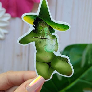 Sticker sorcière verte en train de fumer
