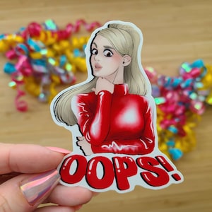 May include: A sticker featuring a cartoon woman with blonde hair wearing a red turtleneck top and the word "OOPS!" in red bubble letters.