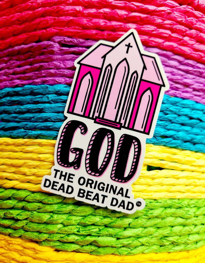 A sticker of a pink church with text that reads "GOD the original dead beat dad tm"