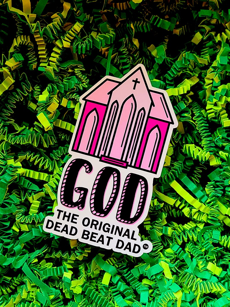 A sticker of a pink church with text that reads "GOD the original dead beat dad tm"