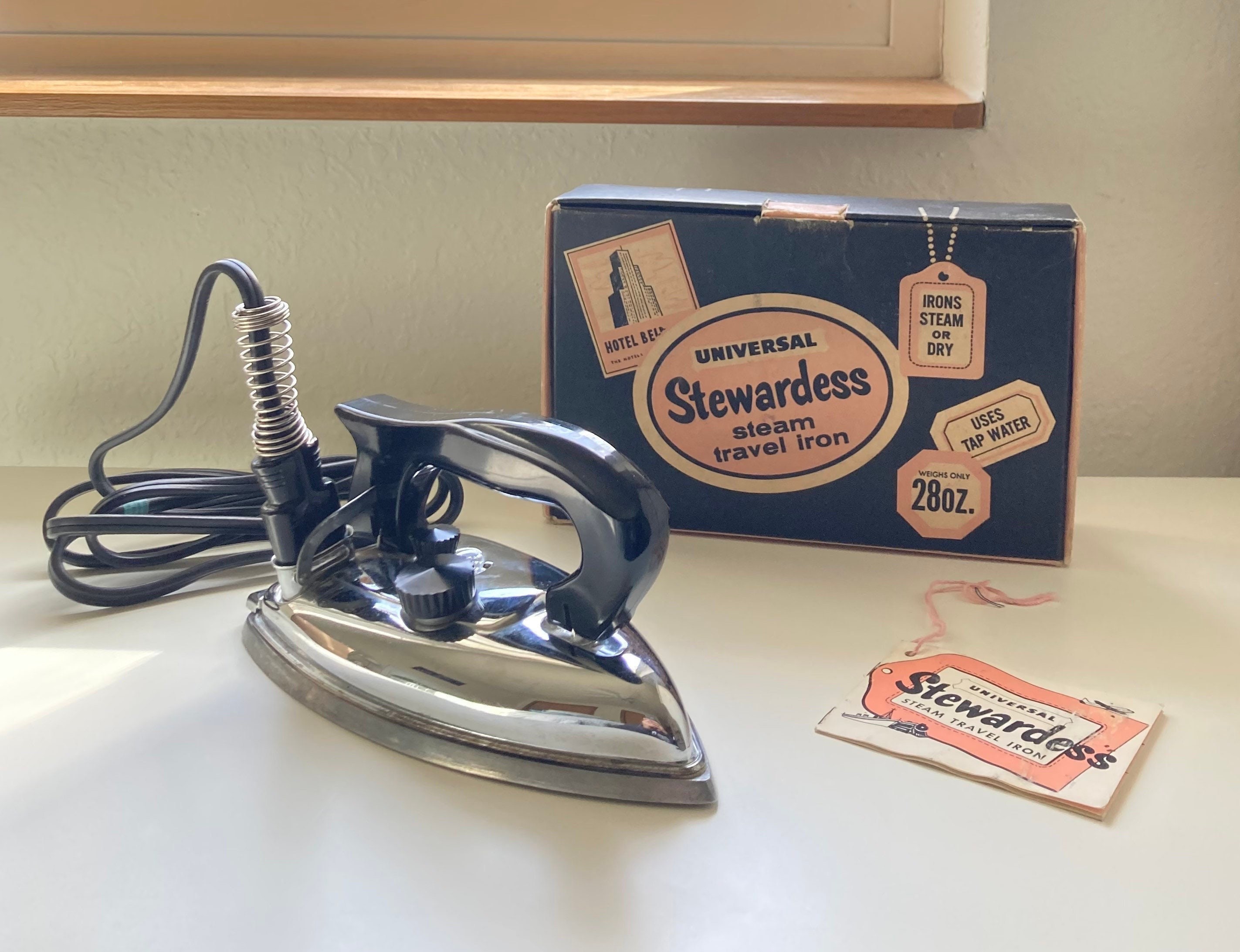 vintage stewardess steam travel iron