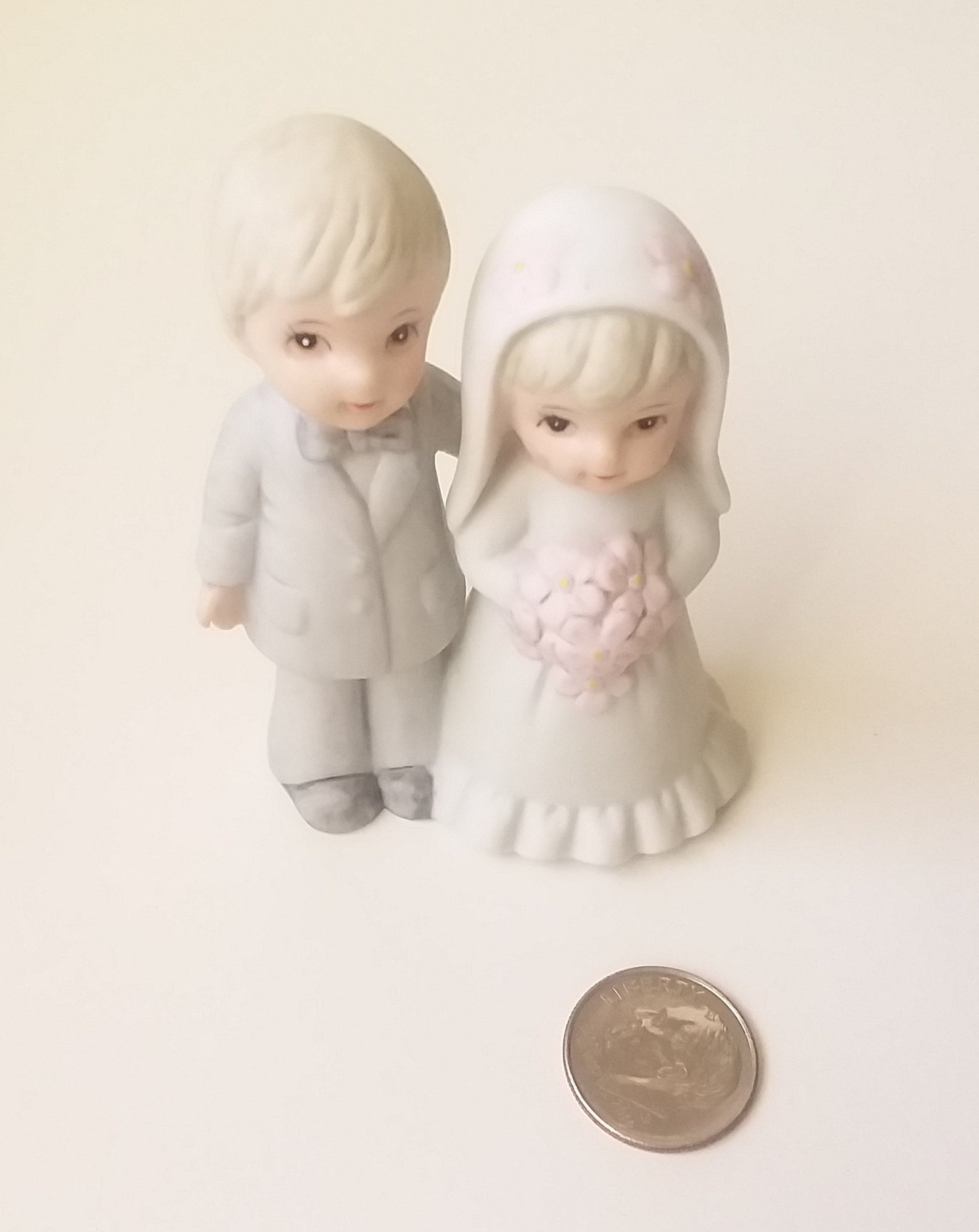 tiny bride and groom figurines