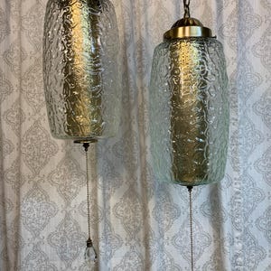 Nice basic pair of long clear glass vintage hanging swag lamp lights