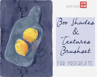 May include: A watercolour illustration of two lemons on a blue chopping board. The image is part of a set of Procreate brushes called "Boo Shades & Textures Brushset".