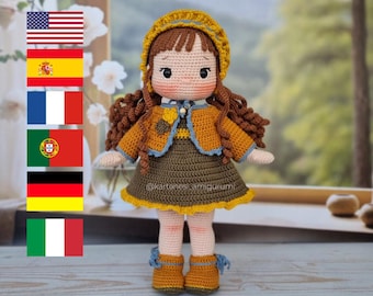 May include: A crocheted doll with brown hair, wearing a yellow and brown dress, a yellow jacket, and a yellow hat. The doll is standing on a wooden surface.