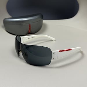 Vintage Unisex Prada Sport Rimless Sunglasses SPS 07F White Frame