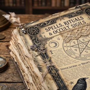 May include: An open book with the title "SPELLS, RITUALS & OCCULT SIGILS" in ornate lettering. The aged pages feature illustrations and text, with a skull charm and dried flowers. A magnifying glass and coins are nearby.