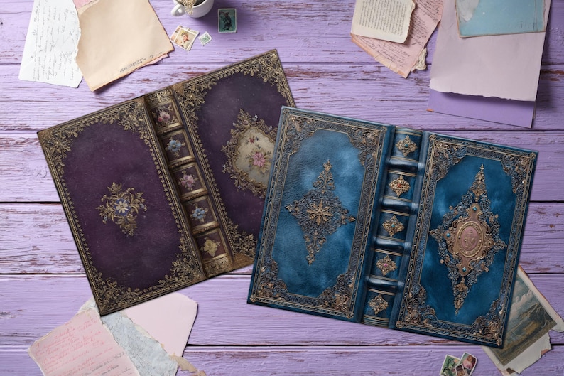 May include: Two antique-style, open books with ornate gold detailing and floral designs. One book has a deep purple cover, the other a teal blue cover. The books are on a light purple wooden surface, with vintage paper scraps scattered around.