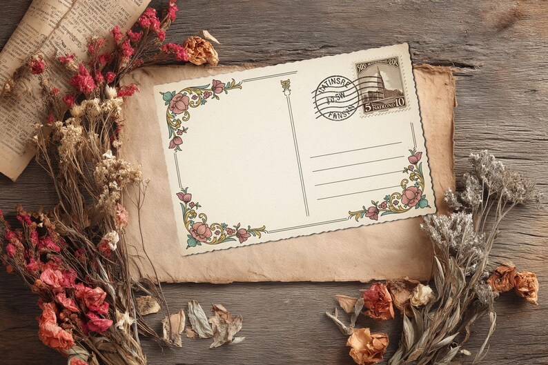 May include: A vintage postcard with floral corner designs and a postage stamp, resting on aged paper. Dried flowers in shades of red, pink, and white surround the postcard, set against a rustic wooden background.