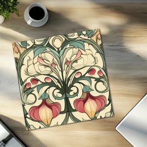 May include: A vintage-style floral pattern with a symmetrical design. The pattern features a light cream background with green, pink, and yellow flowers and leaves.