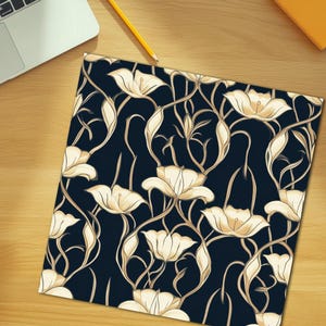 May include: A seamless pattern featuring white flowers with gold outlines on a dark blue background. The flowers are stylized and have a vintage aesthetic.
