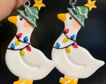 Kerstboomgansoorbellen: kerstsieraden van polymeerklei