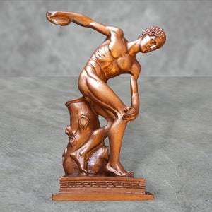 Disco bolus statue, bronze sportsman sculpture,  Roman statue,Greek sculpture, disco bolus of Myron figure, male athlete,pop art sculpture