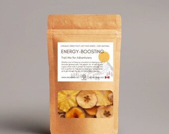 May include: A brown paper bag with a clear window showing dried fruit inside. The bag is labeled "ENERGY-BOOSTING Trail Mix for Adventurers". The label also says "ORGANIC DRIED FRUIT - NOTHING ADDED - 100% NATURAL".