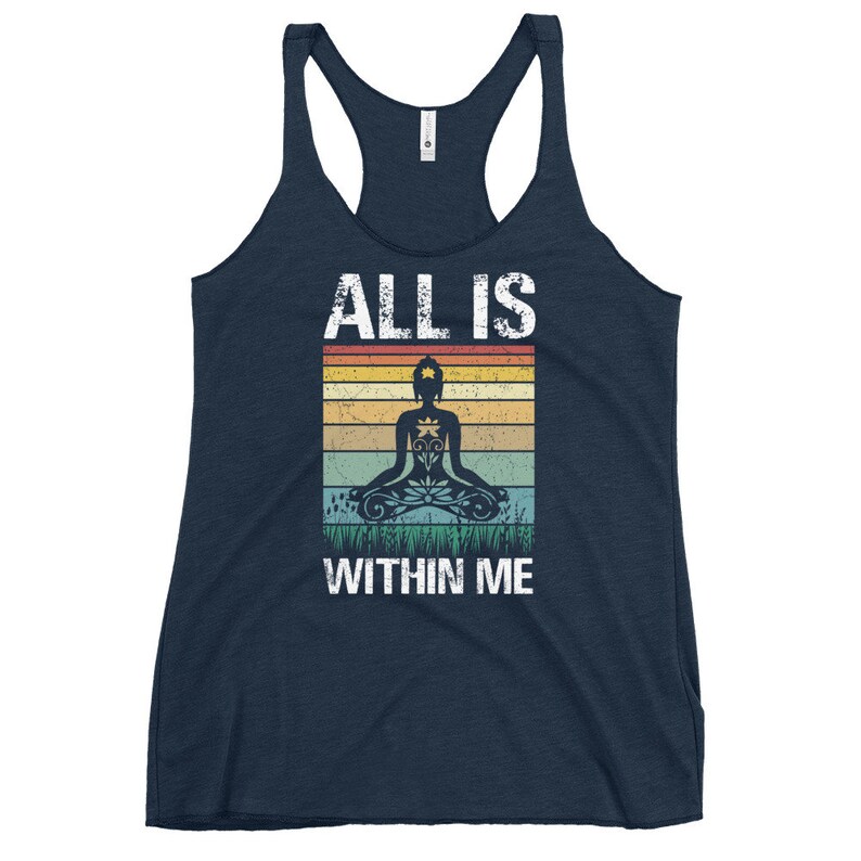 May include: A navy blue tank top with a vintage-style graphic of a meditating figure with the text "ALL IS WITHIN ME".