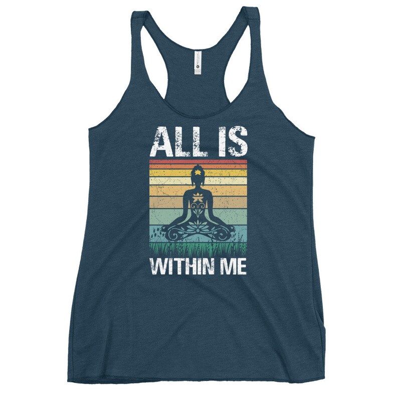 May include: A navy blue tank top with a vintage-style graphic of a person meditating with the text "ALL IS WITHIN ME".