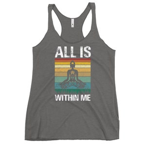 May include: Gray tank top with a vintage-style graphic of a person meditating with the text "ALL IS WITHIN ME".