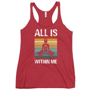 May include: Red tank top with a vintage-style graphic of a person meditating with the text "ALL IS WITHIN ME".