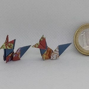 2 volpi (2 cm)/ miniature/origami / rosso fantasia/ creazioni artistiche /  decorazione / idea regalo