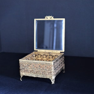French Regency Brass pierced Ormolu footed Jewelry Box / beveled hinged glass lid