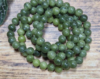 Pulseras de piedras preciosas de jade nefrita genuino de alto grado de 10 mm con banda elástica ajustable.
