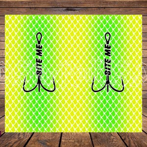 May include: A graphic design featuring a fish scale pattern in shades of yellow and green. Two black fishing hooks are centered, each with the text "BITE ME" in white. The design is set against a wooden background.