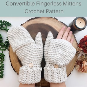 May include: Convertible fingerless mittens crochet pattern. The image shows a pair of light beige crocheted mittens. The mittens have a flap that can be buttoned up to cover the fingers. The cuffs are ribbed, and each mitten has a wooden button. The text "Convertible Fingerless Mittens Crochet Pattern" is at the top.