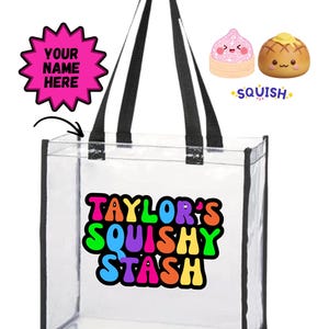 May include: A clear plastic tote bag with black trim and black handles. The front features the colorful text "TAYLOR'S SQUISHY STASH" in a bold, rounded font. A pink starburst graphic with the text "YOUR NAME HERE" is shown above the bag.