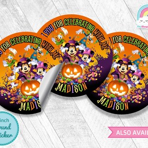 May include: Three 3-inch round stickers featuring Mickey Mouse and friends dressed in Halloween costumes. The stickers have an orange background with purple and black accents. The text on the stickers reads "Thank you for celebrating with me" and "Madison".