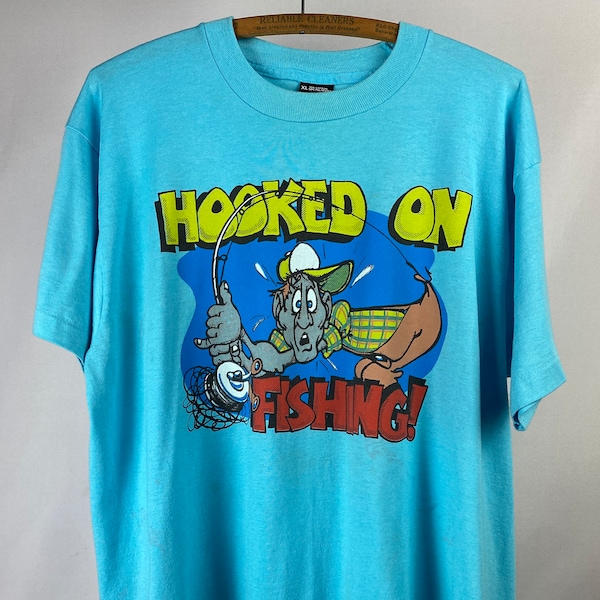 1980s Hooked On Fishing Graphic T-Shirt | Screen Stars Best | Single Stitch | Made in USA | Funny Humor Novelty | Outdoors | Grandpa Dad