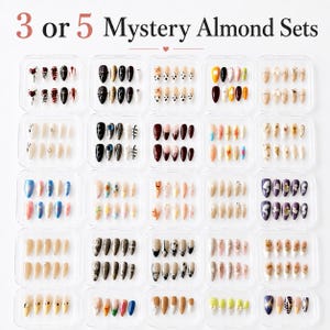 May include: A collection of almond-shaped press-on nails in clear plastic cases. The image features various designs, including solid colors, patterns, and embellishments. Text at the top reads "3 or 5 Mystery Almond Sets."