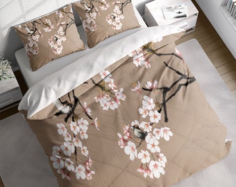 May include: A brown duvet cover with a white floral pattern and small birds. The duvet cover has a subtle, textured background.