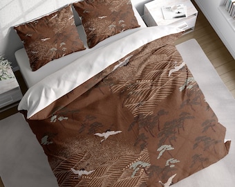 May include: Brown duvet cover with a white and brown patterned design featuring stylized trees, waves, and birds. The duvet cover is shown on a bed with two matching pillowcases.