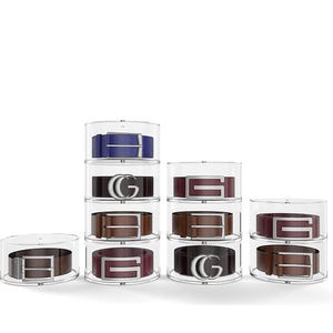 May include: A set of four clear acrylic belt organisers, each with three tiers. The organisers are filled with belts in various colours and styles, including brown, black, blue, and red.