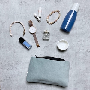 Light blue corduroy cosmetic bag (20×13×3 cm) – handcrafted with black cotton lining and zipper | Compact pouch for travel & beauty items