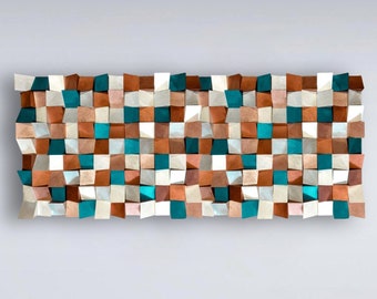May include: A wall art piece made of wood with a geometric pattern of squares in shades of teal, copper, and white.