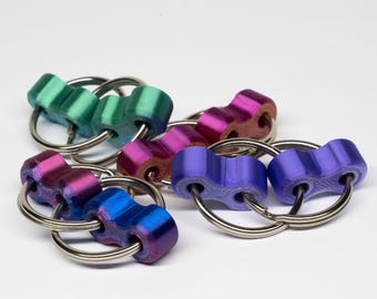 The Linkage - Brinquedo Fidget Giratório Silencioso