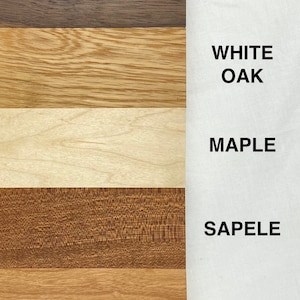 May include: Five wood samples labeled with their names: Walnut, White Oak, Maple, Sapele, and Cherry.