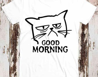 May include: White t-shirt with a black and white illustration of a grumpy cat and the text "GOOD MORNING".