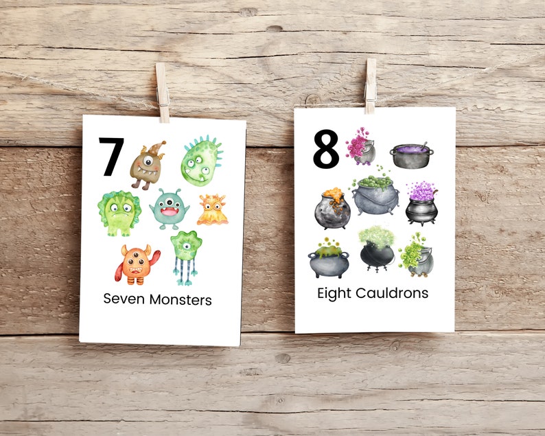 Puede incluir: Dos tarjetas blancas con n&uacute;meros negros e ilustraciones. La primera tarjeta muestra el n&uacute;mero 7 y siete monstruos verdes, naranjas y azules. El texto "Seven Monsters" est&aacute; debajo de las ilustraciones. La segunda tarjeta muestra el n&uacute;mero 8 y ocho calderos negros con l&iacute;quido morado, verde y amarillo. El texto "Eight Cauldrons" est&aacute; debajo de las ilustraciones.