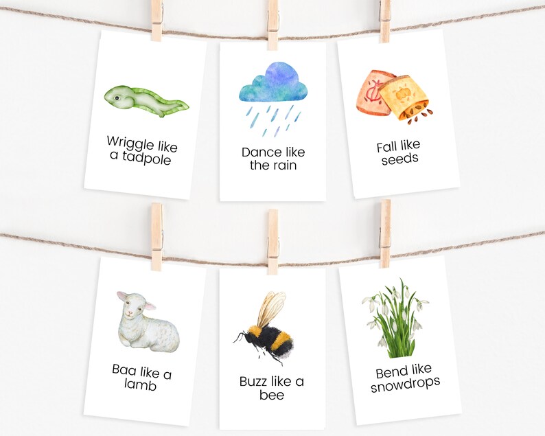 K&ouml;nnte beinhalten: Sechs wei&szlig;e Karten mit Aquarell-Illustrationen und Text. Die Karten zeigen eine Kaulquappe, eine Regenwolke, Samen, ein Lamm, eine Biene und Schneegl&ouml;ckchen. Jede Karte hat einen Spruch, der die Bewegung des Objekts auf dem Bild beschreibt, wie "Wriggle like a tadpole" und "Dance like the rain".