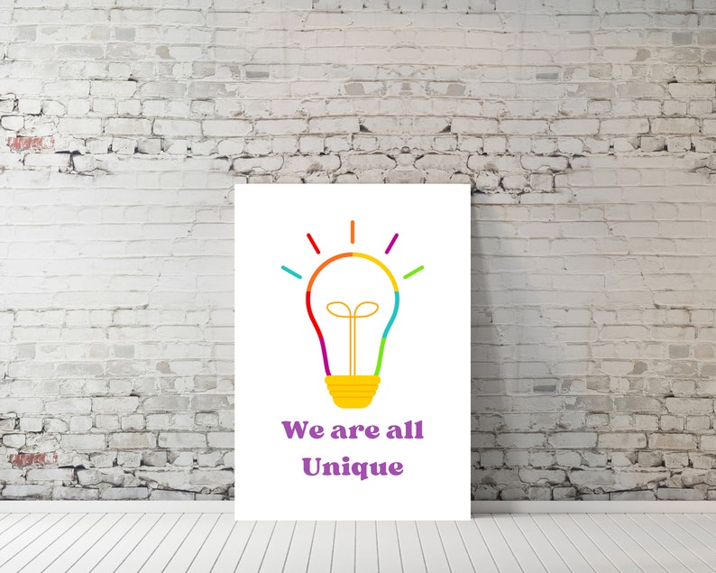 May include: A white poster with a colorful lightbulb illustration and the text "We are all Unique".