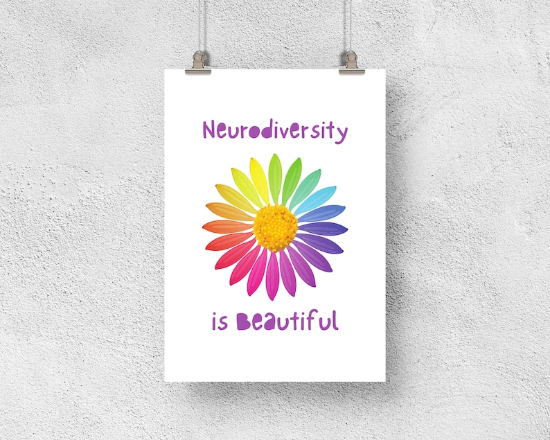 May include: A white poster with the text "Neurodiversity is beautiful" in purple lettering. A colorful rainbow daisy is in the center of the poster.