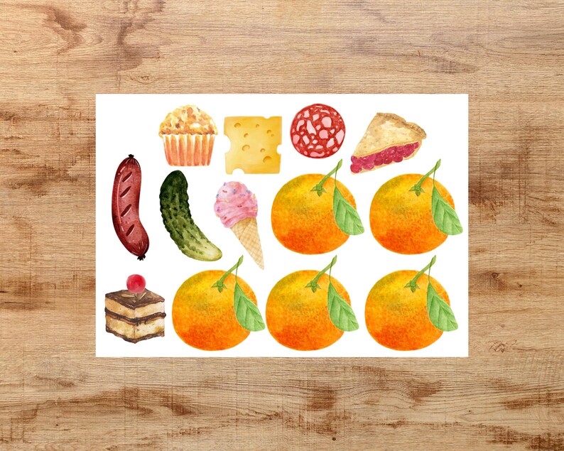 May include: A collection of watercolor illustrations of various food items, including a sausage, a pickle, a muffin, a slice of cheese, salami, a slice of pie, an ice cream cone, oranges, and a slice of cake.