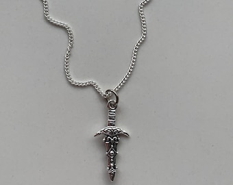 Handmade dagger necklace, made with silver plated chain. Complete with mini hessian bag.