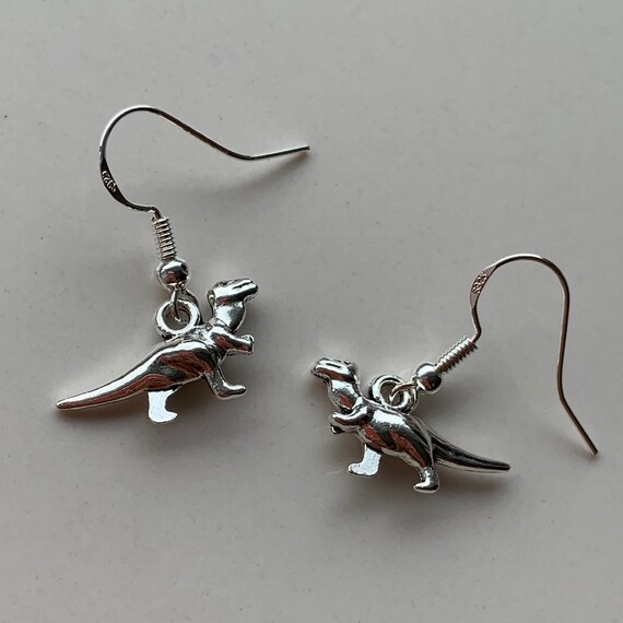 Silver dinosaur dangle earrings with sterling silver, hypoallergenic hooks,  dino earrings, alt, trippy, jewellery, kid core, indie, nerd,