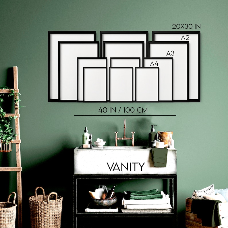 May include: A collection of nine rectangular black picture frames arranged in a grid on a green wall above a vanity. The frames are labeled with sizes including A2, A3, A4, 20x30 inches, and a total width of 40 inches.