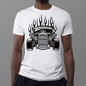 May include: A white t-shirt with a black and white illustration of a hot rod car with flames. The car has a grill, headlights, and a hood scoop.
